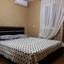 Двуспальная кровать коттеджи Sea Breeze в Кирилловке на Азовском море