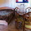 Деревянная мебель в номере гостевой дом Адажио на косе Пересыпь в Кирилловке