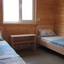 Удобные кровати в коттедже Уютный на Бирючем острове