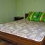 База отдыха Экватор в Кирилловке двуспальная кровать в номере