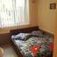 Двуспальная кровать в номере база отдыха Азов Центр в Кирилловке