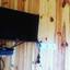 Телевизор в номере гостевой дом Доминика в Кирилловке 