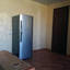 Холодильник в номере гостевой дом Уютный дворик в Кирилловке