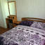 удобная кровать в номере гостевой дом Уютный дворик в Кирилловке 