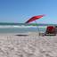 Шезлонги с зонтиком от солнца на пляже Бирючий