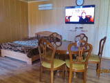 деревянная мебель в номере гостевой дом Адажио в Кирилловке