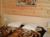Золотой берег - з-комнатный деревянный домик - двуспальная кровать