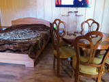двуспальная кровать гостевой дом Адажио в Кирилловке 